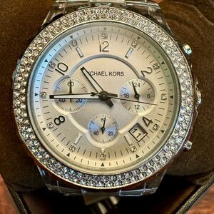 MICHAEL KORS rhinestone watch with adjustable date.